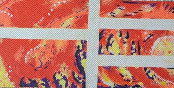 Abstract acrylic artwork behind a grid