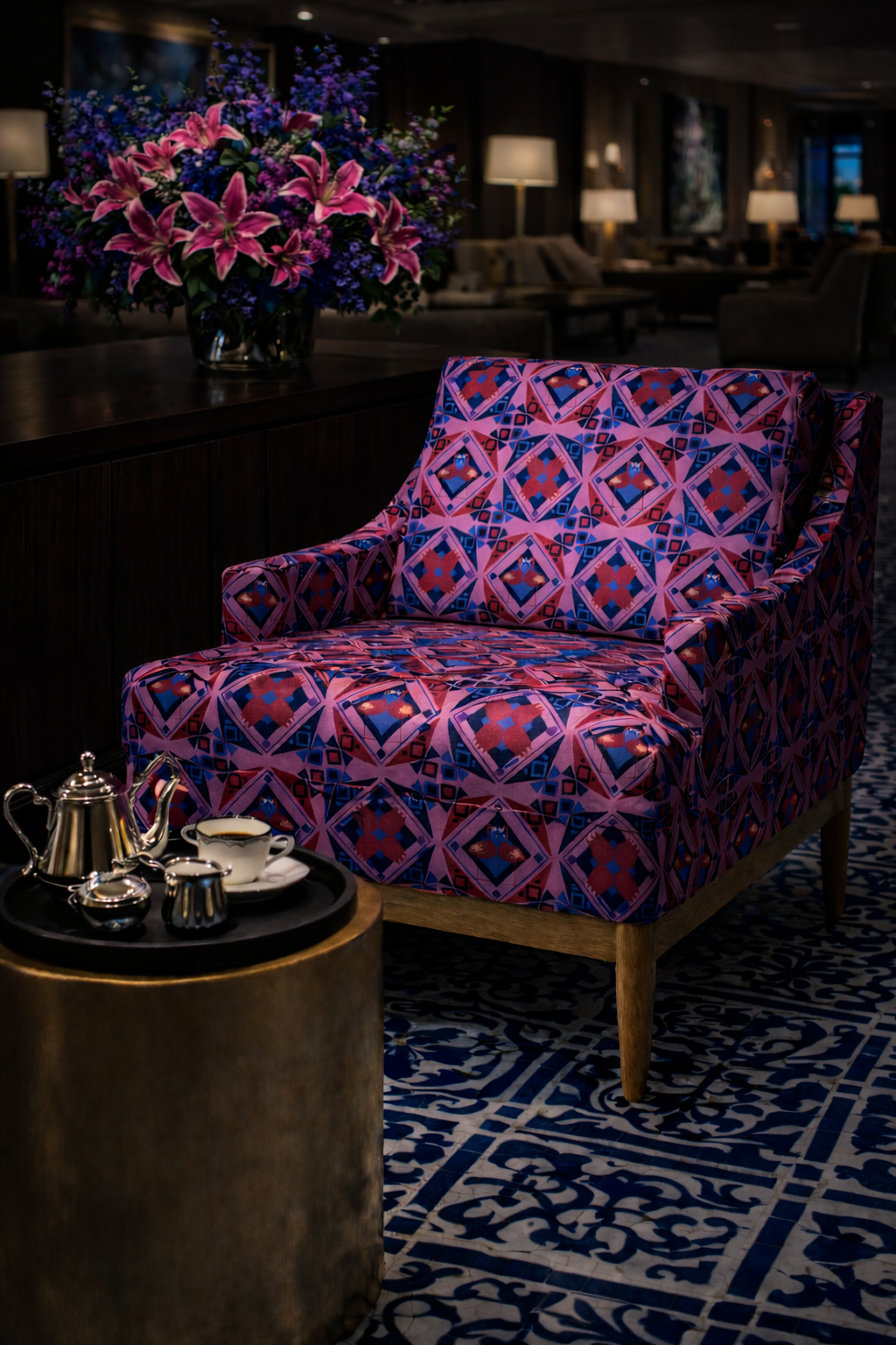 Tulip Flamingo print fabric on chair in luxury setting